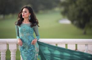 Miss Myanmar 2014 Eaindra poses in her evening gown at the 63rd annual Miss Universe Pageant in Miami